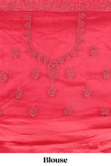 Bright red net lehenga intricate embroidery andpaired with a matching embroidered blouse