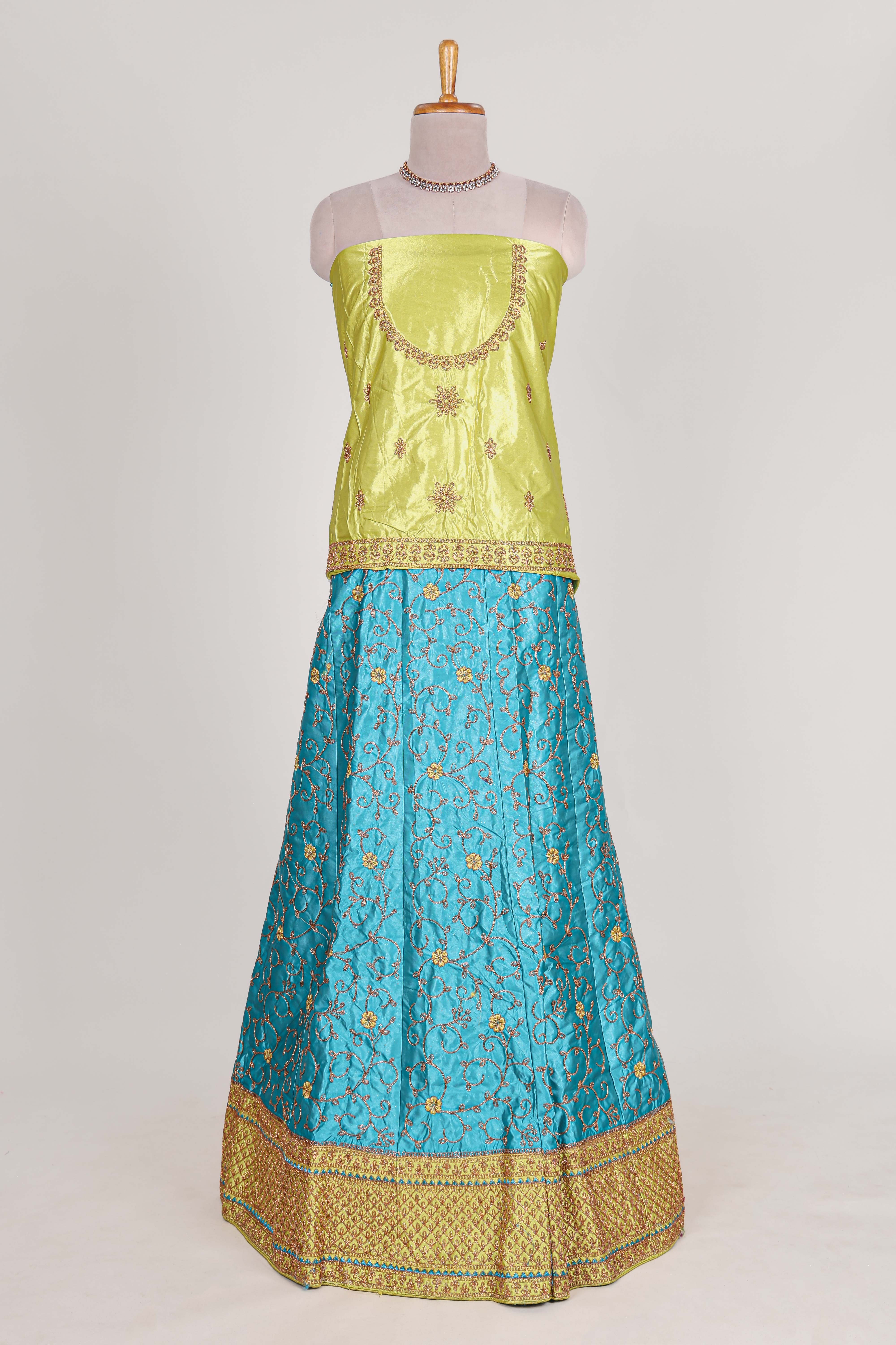 Blue and yellow satin lehenga embroidery with a beautiful contrast border paired with a matching embroidered blouse