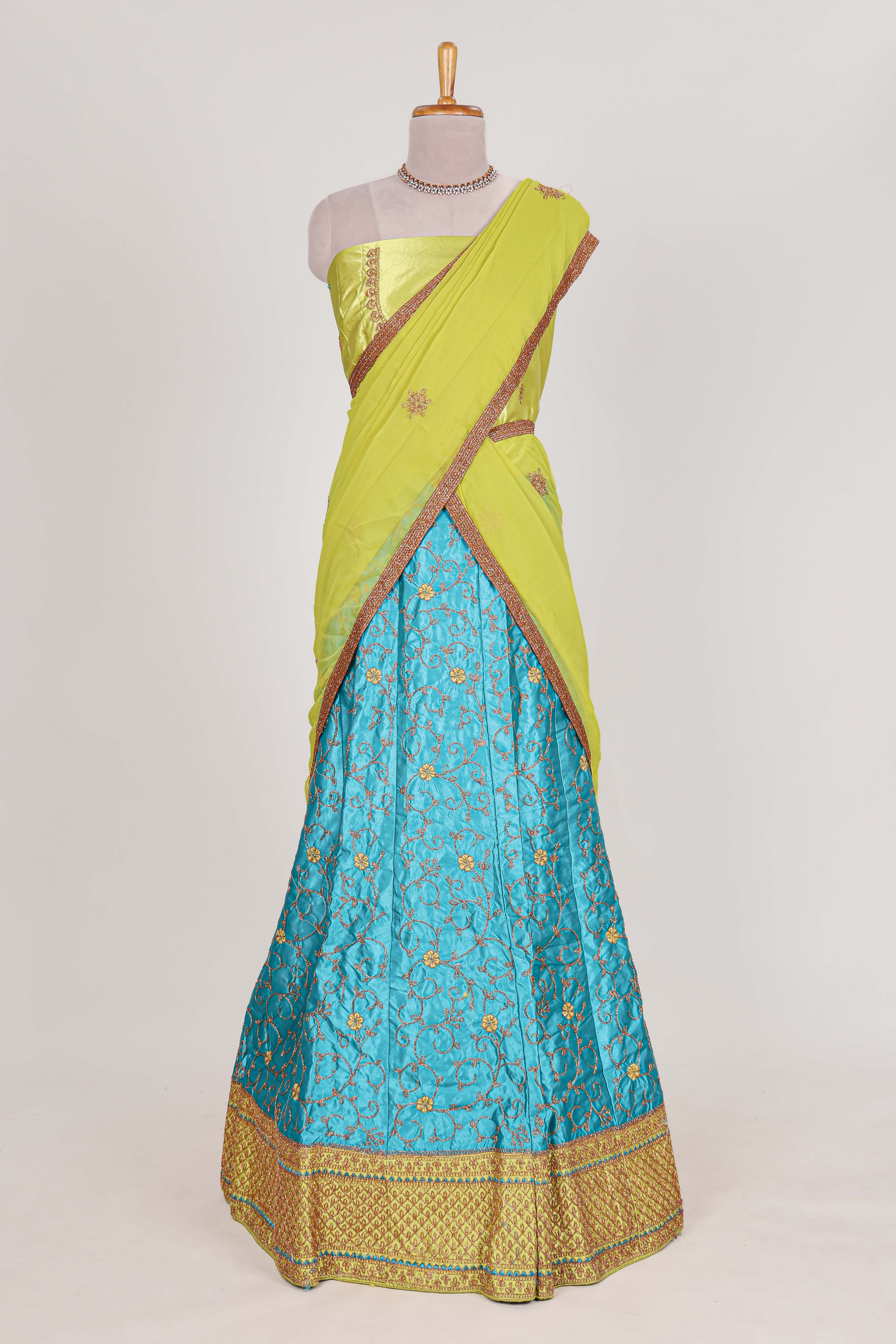 Blue and yellow satin lehenga embroidery with a beautiful contrast border paired with a matching embroidered blouse