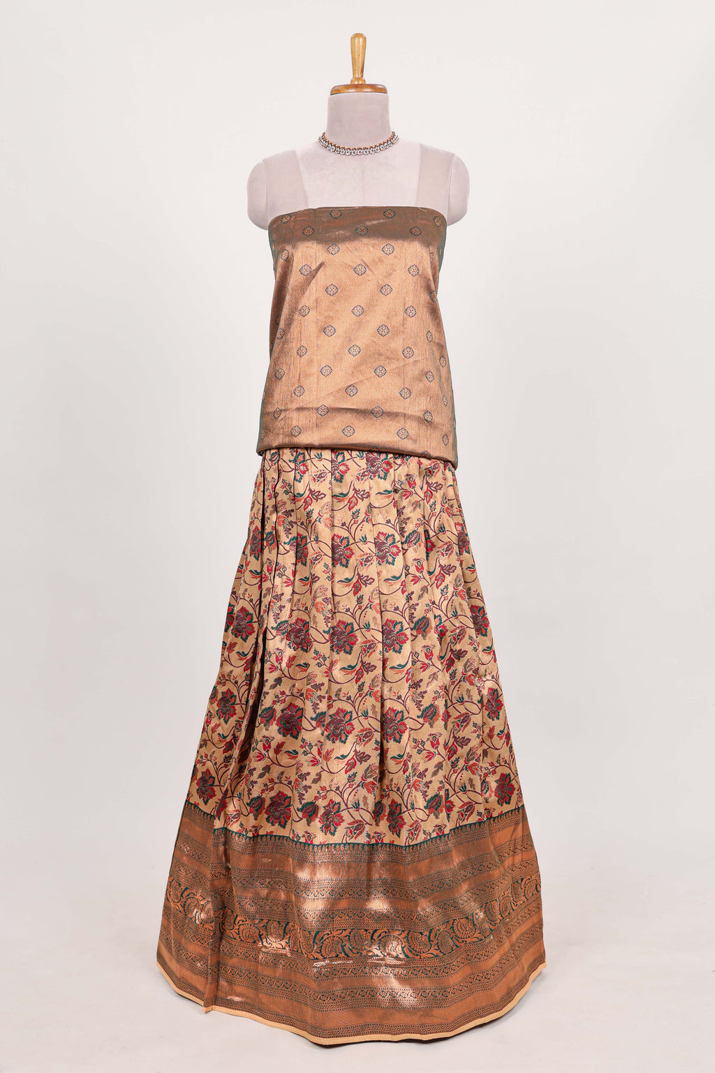 Green tissue lehenga featuring intricate thread weaving details with a beautiful contrast border Paired with a brocade  shawl
