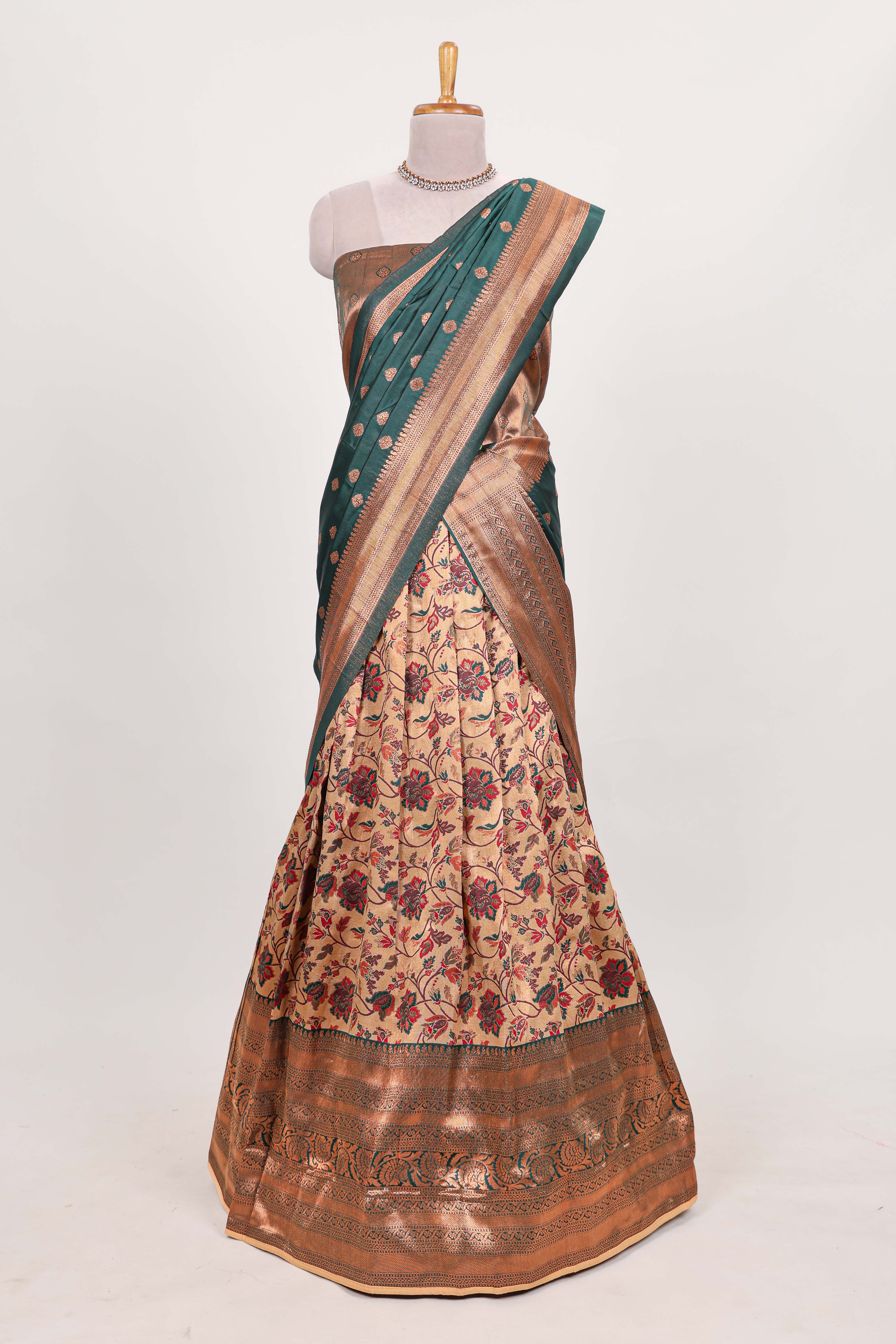 Green tissue lehenga featuring intricate thread weaving details with a beautiful contrast border Paired with a brocadeshawl