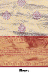 Red tissue lehenga featuring intricate thread weaving details with a beautiful contrast border Paired with a brocadeshawl