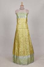 Lemon yellow tissue lehenga featuring elegant vertical line patterns with a beautiful contrast border Paired with a matching shawl