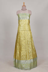 Lemon yellow tissue lehenga featuring elegant vertical line patterns with a beautiful contrast border Paired with a matching shawl