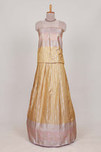 Cream tissue lehenga featuring elegant vertical line patterns with a beautiful contrast border Paired with a matching shawl