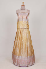 Cream tissue lehenga featuring elegant vertical line patterns with a beautiful contrast border Paired with a matching shawl