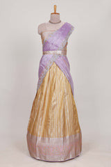 Cream tissue lehenga featuring elegant vertical line patterns with a beautiful contrast border Paired with a matching shawl