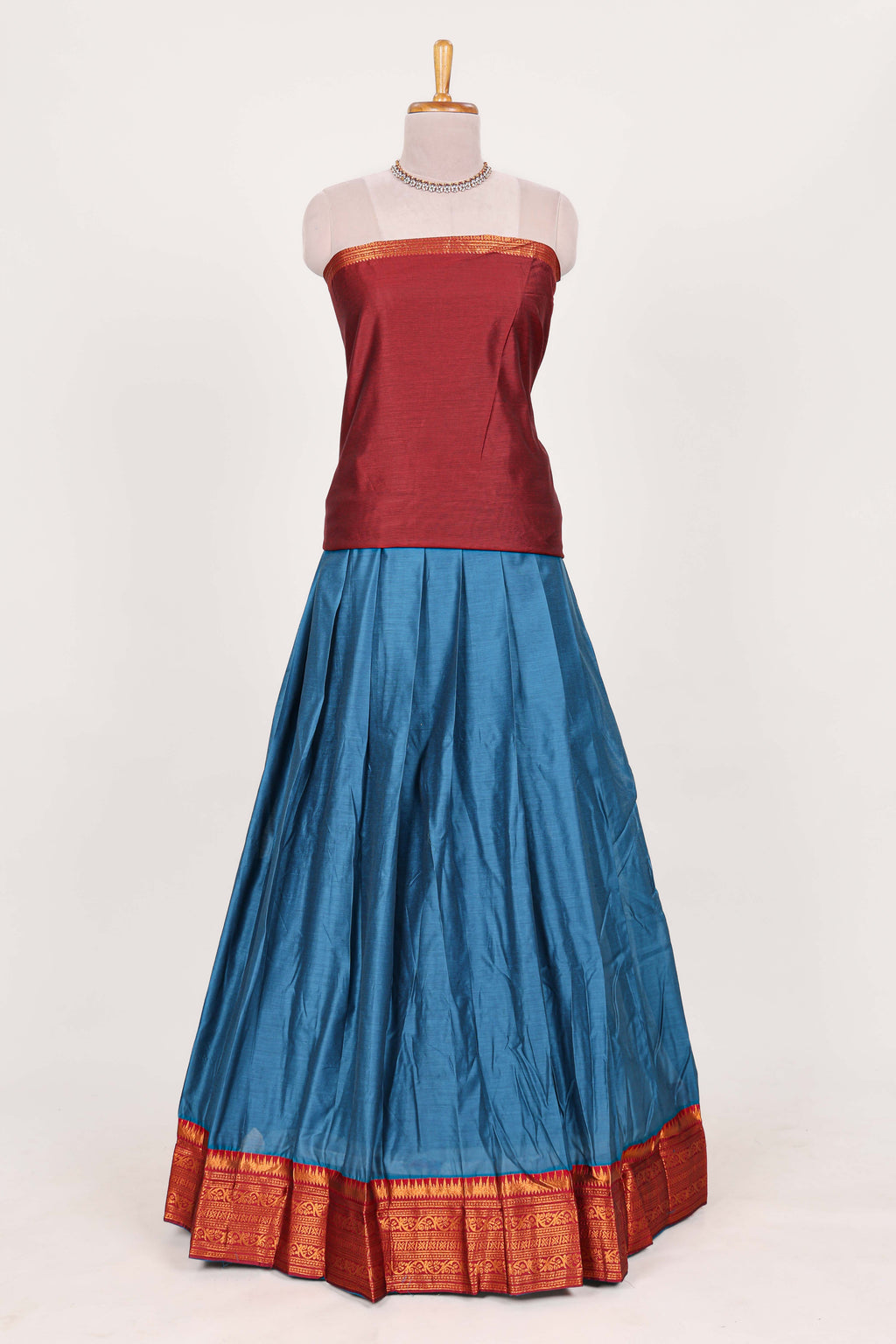 Royal blue  silk cotton lehenga with a rich maroon shawl with a traditional silver zari woven border and contrast blouse