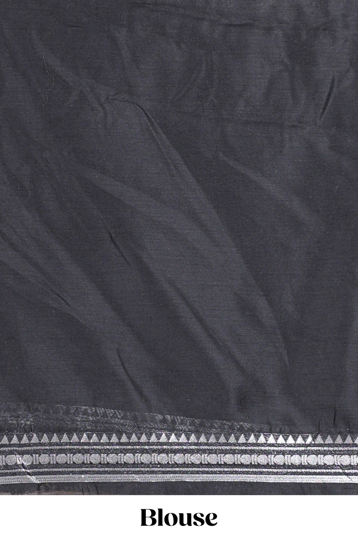 Grey silk cotton lehenga with a black shawl with a traditional silver zari woven border and contrast blouse