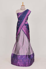 Rich royal purple tissue lehenga featuring intricate thread weaving details with a beautiful contrast border Paired with a brocadeshawl