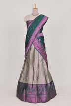 Silver tissue lehenga featuring intricate thread weaving details with a beautiful contrast border Paired with a brocade  shawl