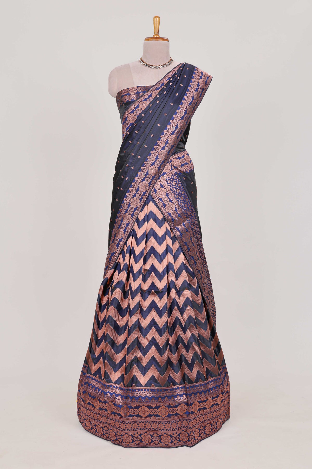 Navy blue  lehenga featuring intricate copper thread weaving details with a beautiful contrast border Paired with a brocade  shawl
