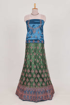 Green and blue Beautiful net lehenga with intricate embroidery stone work and contrast border paired with a contrast net shawl
