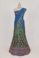 Green and blue Beautiful net lehenga with intricate embroidery stone work and contrast border paired with a contrast net shawl