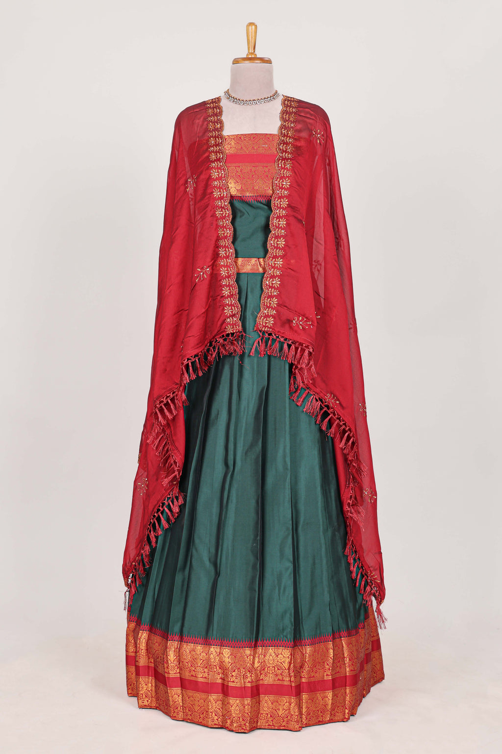 Dark Green and Red Cotton Half Saree with Gold Zari Border Traditional Embroidery and Elegant Tassel Detailing