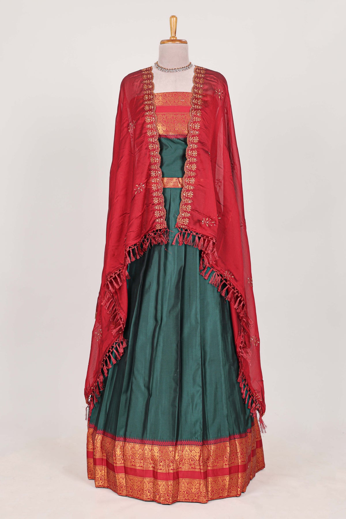 Dark Green and Red Cotton Half Saree with Gold Zari Border Traditional Embroidery and Elegant Tassel Detailing