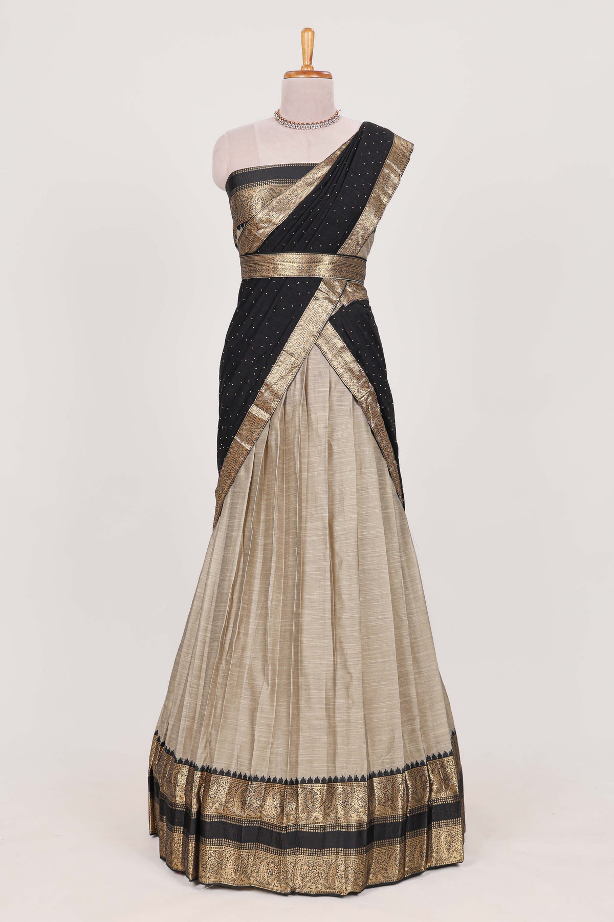 Beige and Black Cotton Half Saree with Gold Zari Border Traditional Embroidery and Elegant Detailing