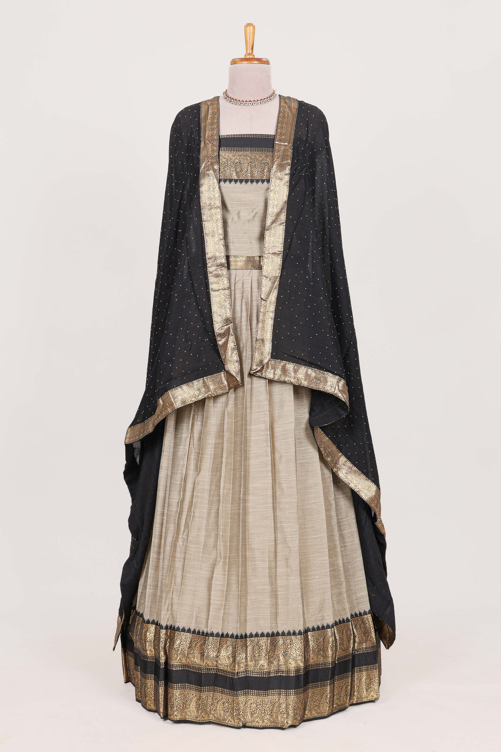 Beige and Black Cotton Half Saree with Gold Zari Border Traditional Embroidery and Elegant Detailing
