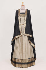 Beige and Black Cotton Half Saree with Gold Zari Border Traditional Embroidery and Elegant Tassel Detailing