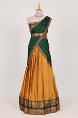 Mustard yellow Cotton Half Saree with Copper Zari Border Traditional Embroidery and Elegant Tassel Detailing