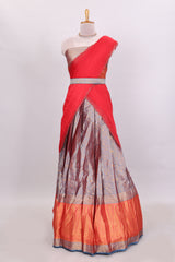 Lavender floral zari lehenga featuring contrasting bentex border Paired with plain red shawl with stone work