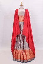 Lavender floral zari lehenga featuring contrasting bentex border Paired with plain red shawl with stone work