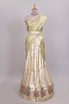Gold shade zari designed lehanga with self floral motifs border and light green shade contrast blouse paired with plain shawl with few floral motifs