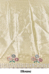 Gold shade zari designed lehanga with self floral motifs border and light green shade contrast blouse paired with plain shawl with few floral motifs