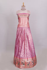 Pink butta designed lehanga with contrast floral design border and contrast blouse paired with matching floral butta motifs shawl