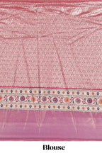 Pink butta designed lehanga with contrast floral design border and contrast blouse paired with matching floral butta motifs shawl
