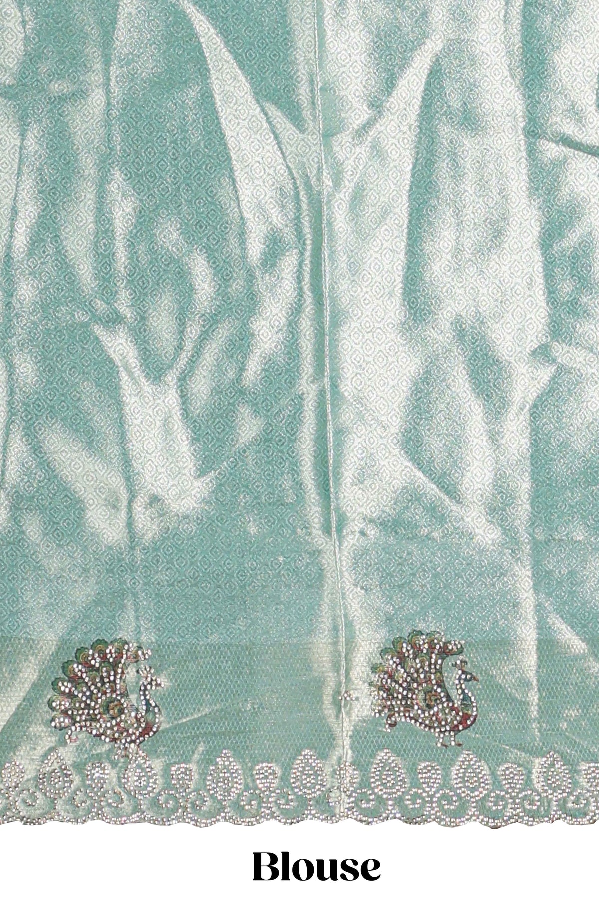 Off white plain lehanga featuring self floral butta design border and contrast teal green blouse beautifully embellished with a stone-work border paired with matching shawl