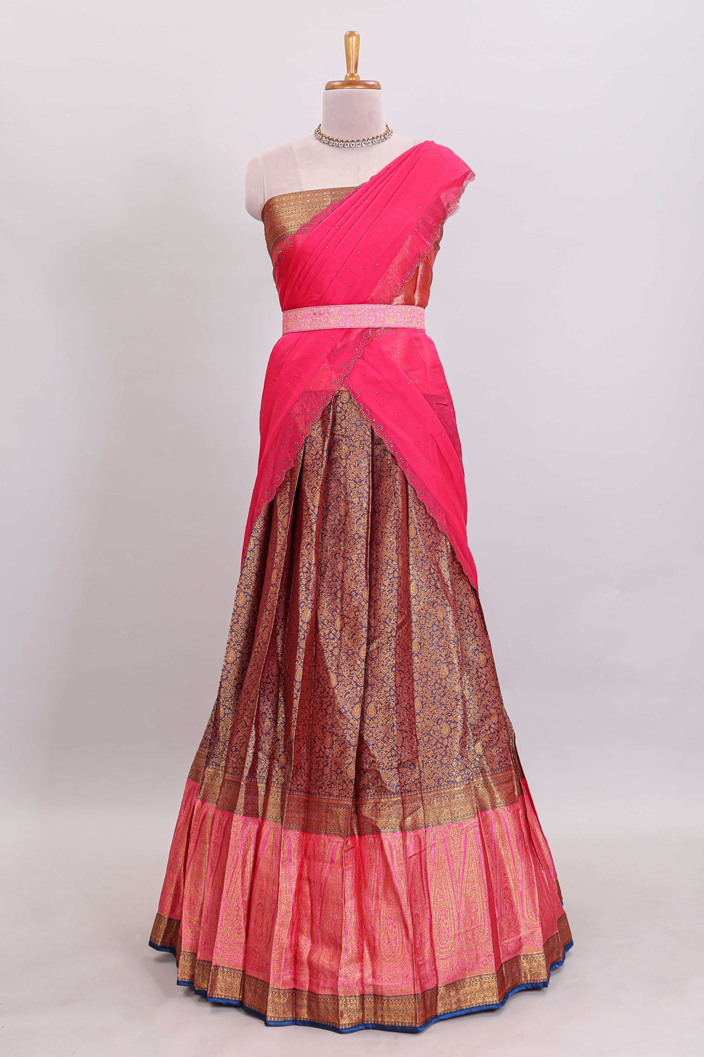 Maroon floral zari design lehanga featuring contrast border and blouse paired with contrast shawl