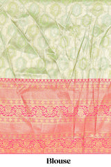 Pastel green Manga Butta motifs lehanga featuring contrasting border and matching blouse paired with contrast red shawl