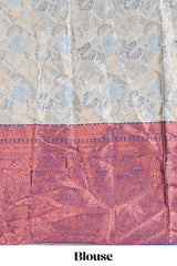 Antique ivory unique designed lehanga featuring contrasting border and matching blouse paired with contrast navy blue shawl