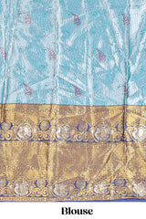 Light blue shade manga motifs lehanga featuring contrasting zari border and matching blouse paired withnavy blue organza shawl
