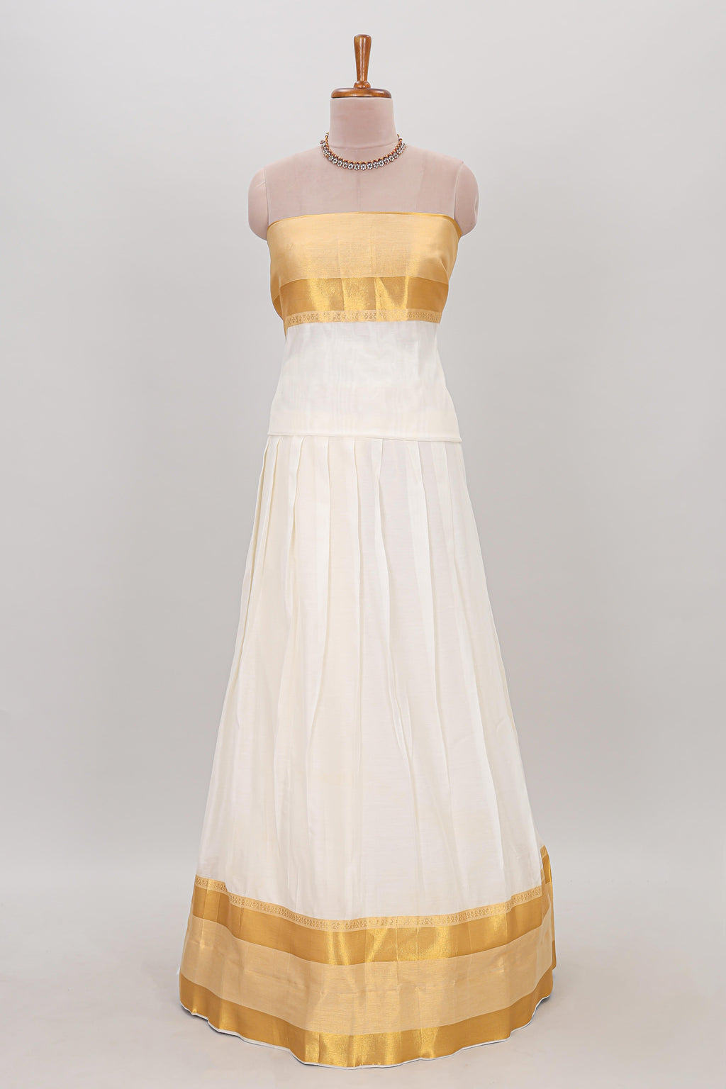 White plain lehanga featuring matching blouse paired with lavender stone work dhavani