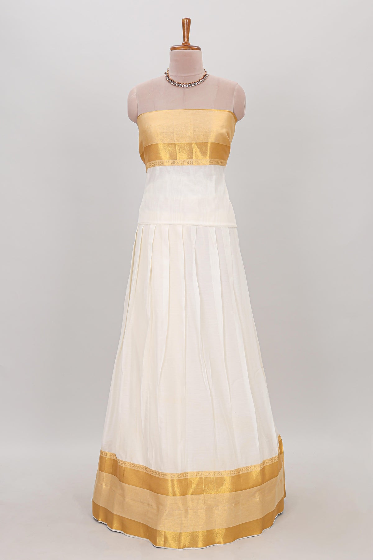 White plain lehanga featuring matching blouse paired with lavender stone work dhavani