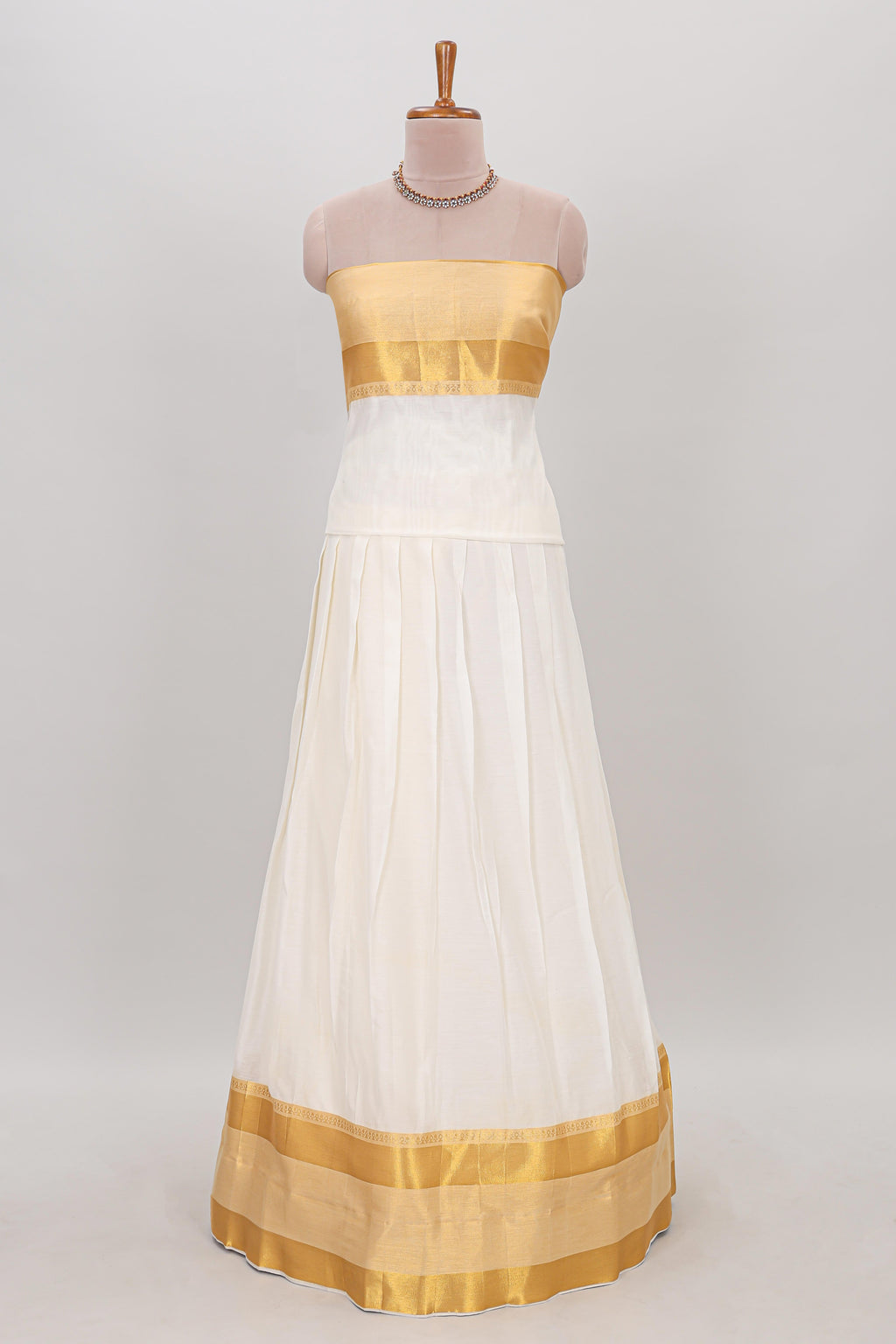 White plain lehanga featuring matching blouse paired with grey stone work dhavani