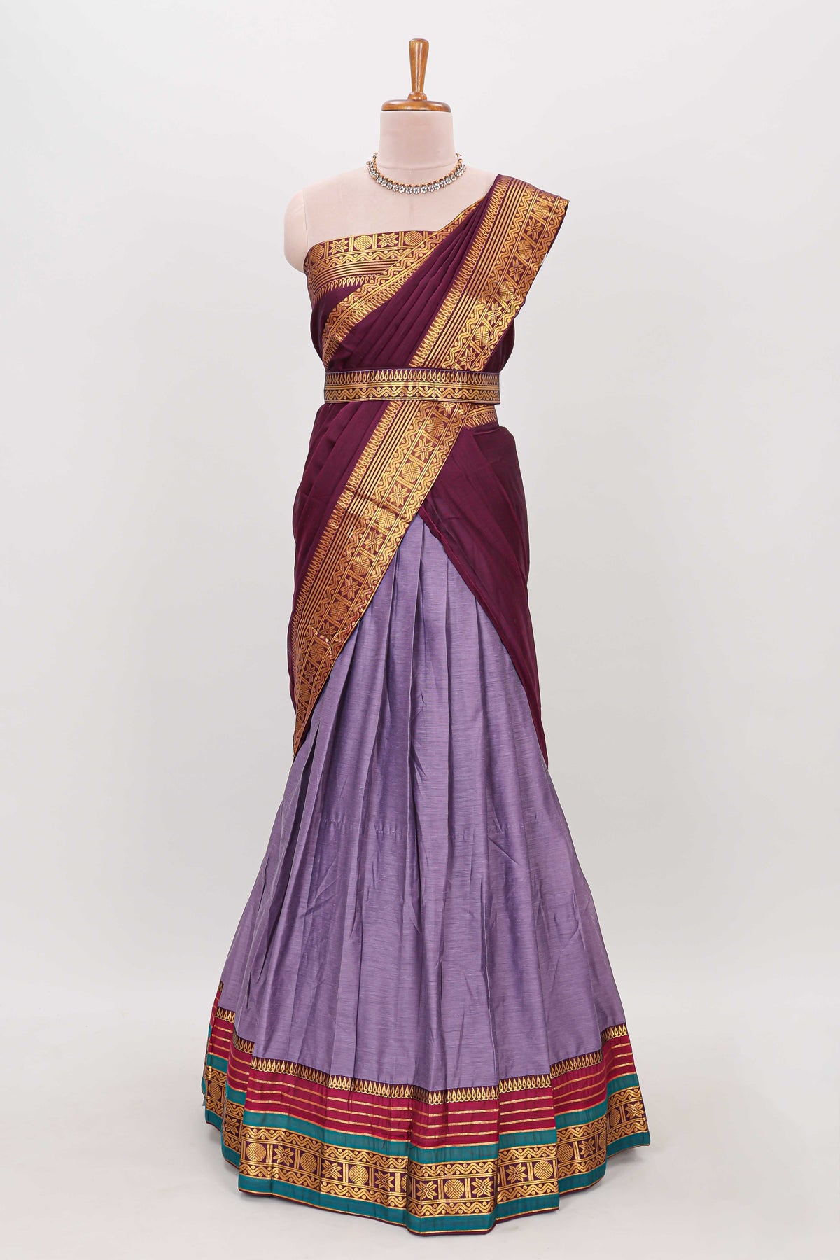Lavender shade plain lehanga featuring contrasting zari border and blouse paired with  maroon  shawl