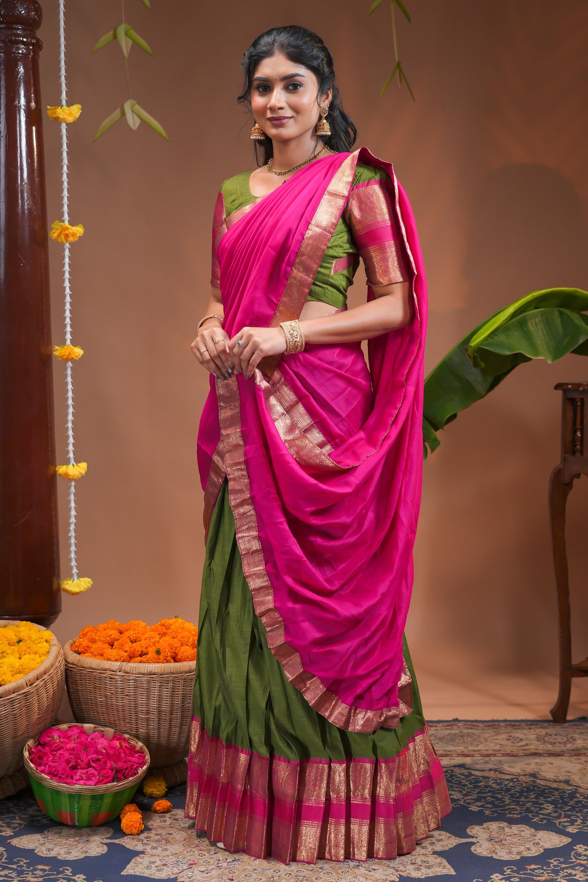 Green plain half saree with matching blouse and contrast zari border and dhavani
