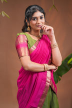 Green plain half saree with matching blouse and contrast zari border and dhavani