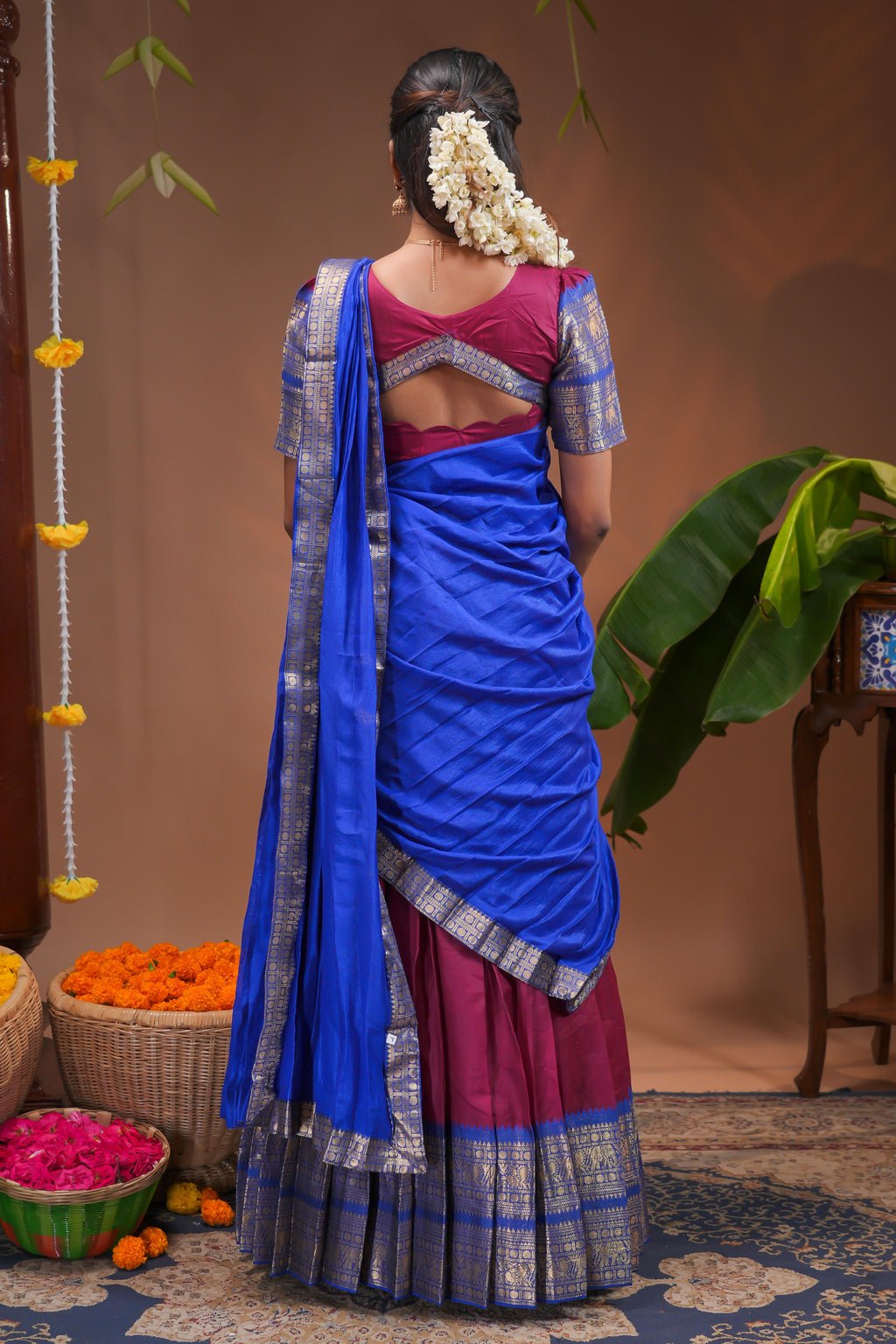 Magenta plain half saree with matching blouse and contrast zari border and  dhavani