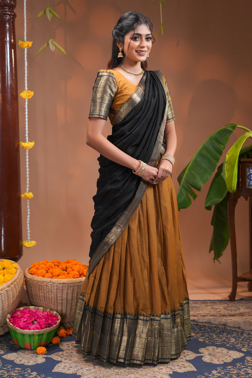 Mustard plain half saree with matching blouse and contrast zari border and  dhavani