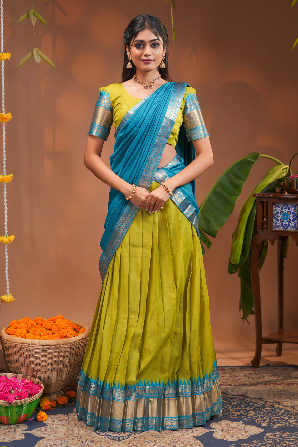 Green plain half saree with matching blouse and contrast zari border and  dhavani