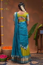 Green plain half saree with matching blouse and contrast zari border and  dhavani
