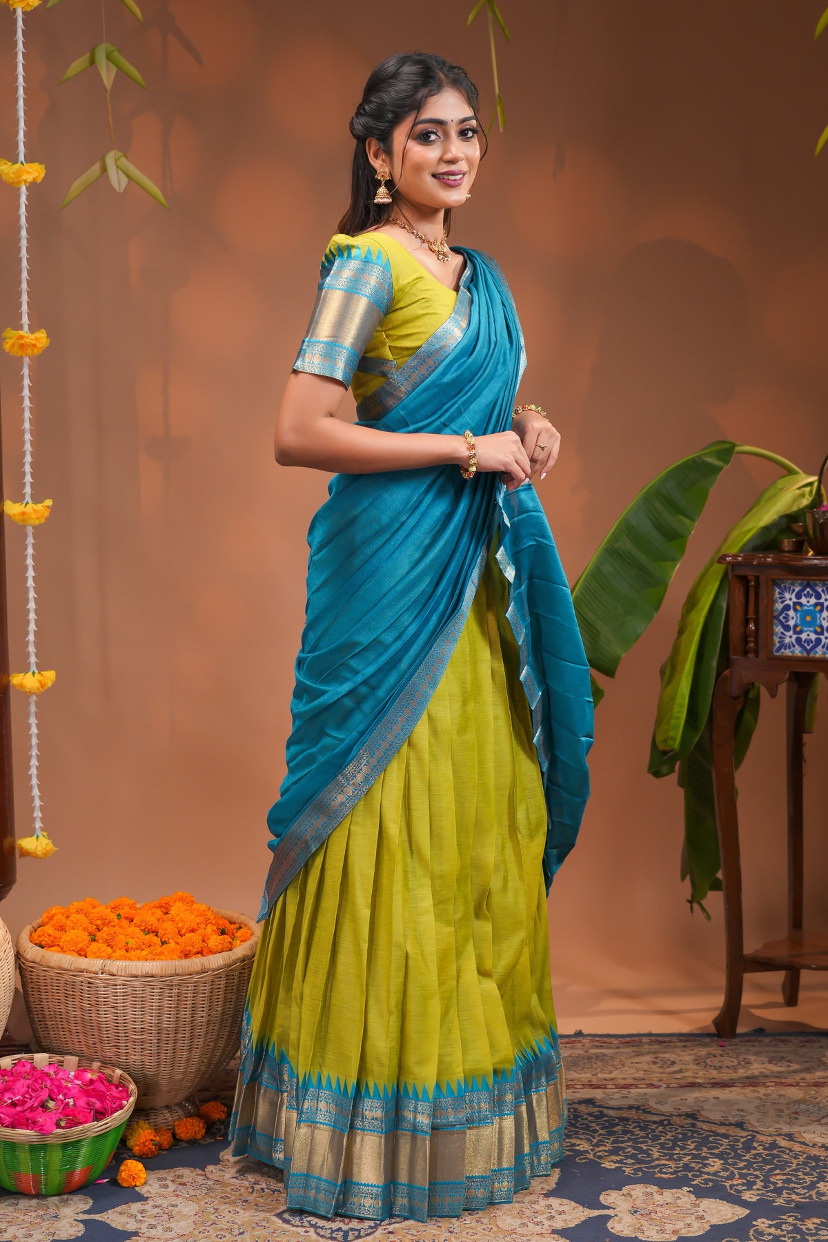 Green plain half saree with matching blouse and contrast zari border and  dhavani
