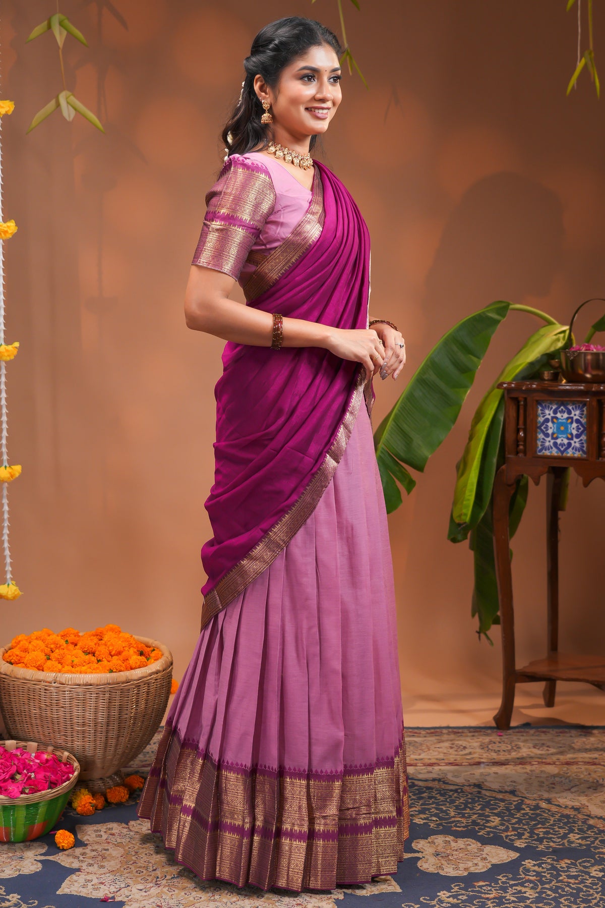 Pink plain half saree with matching blouse and contrast zari border and  dhavani