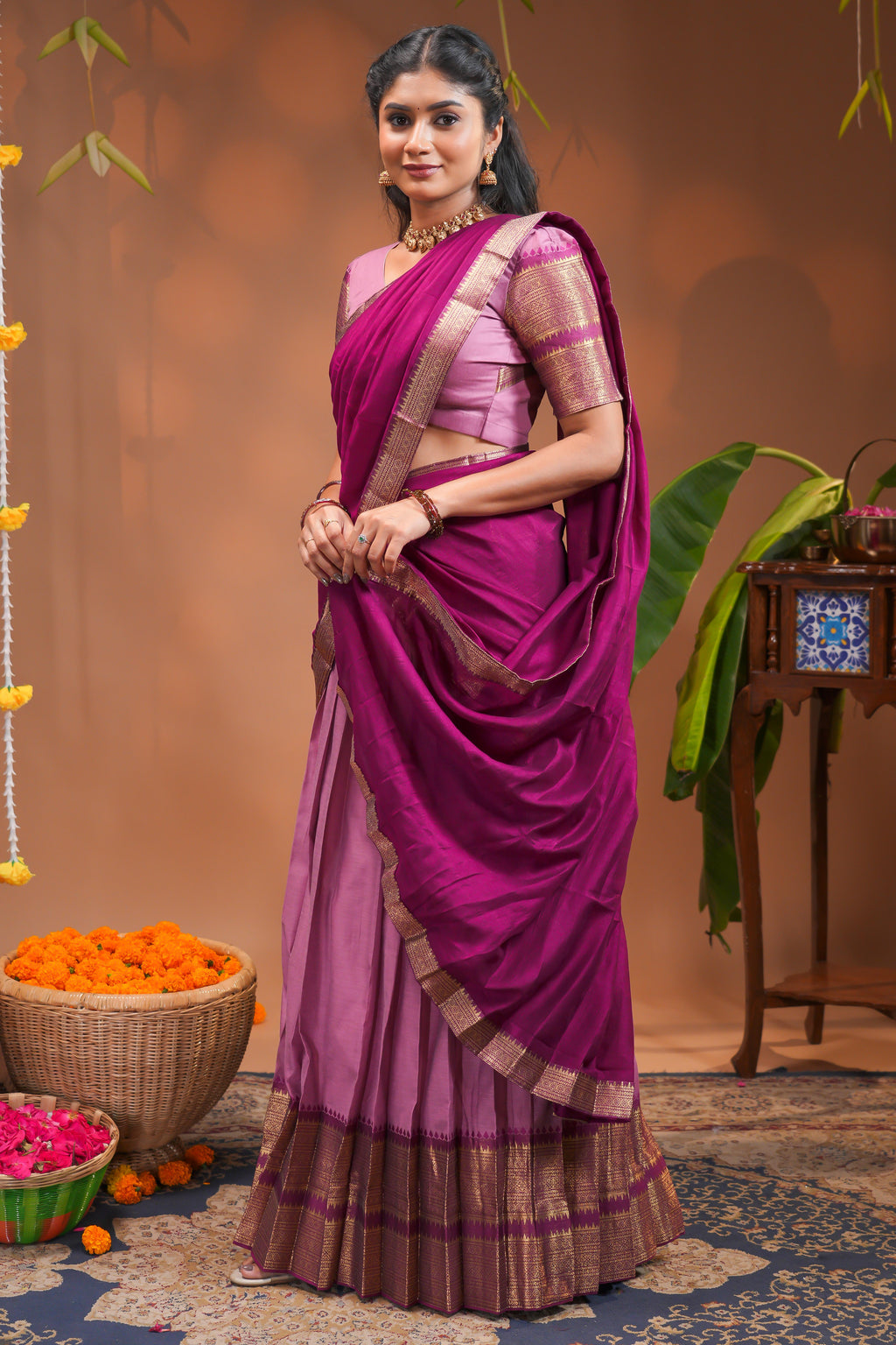 Pink plain half saree with matching blouse and contrast zari border and  dhavani