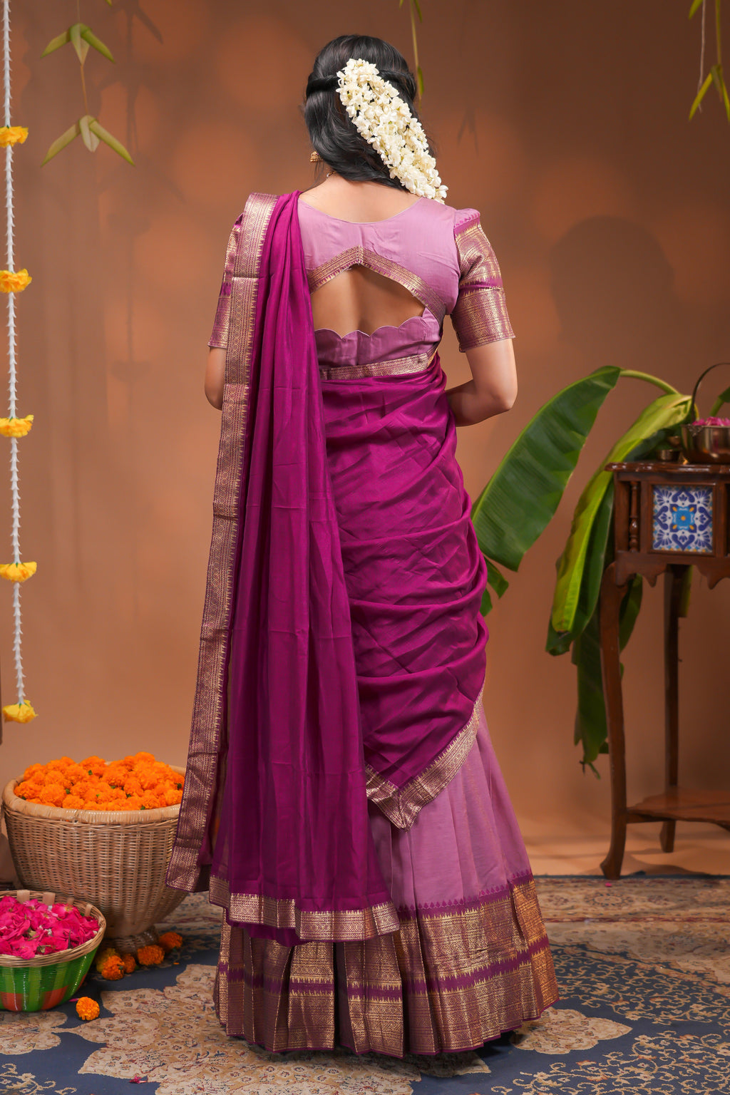 Pink plain half saree with matching blouse and contrast zari border and  dhavani