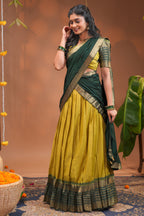 Lime yellow plain half saree with matching blouse and contrast zari border and dhavani